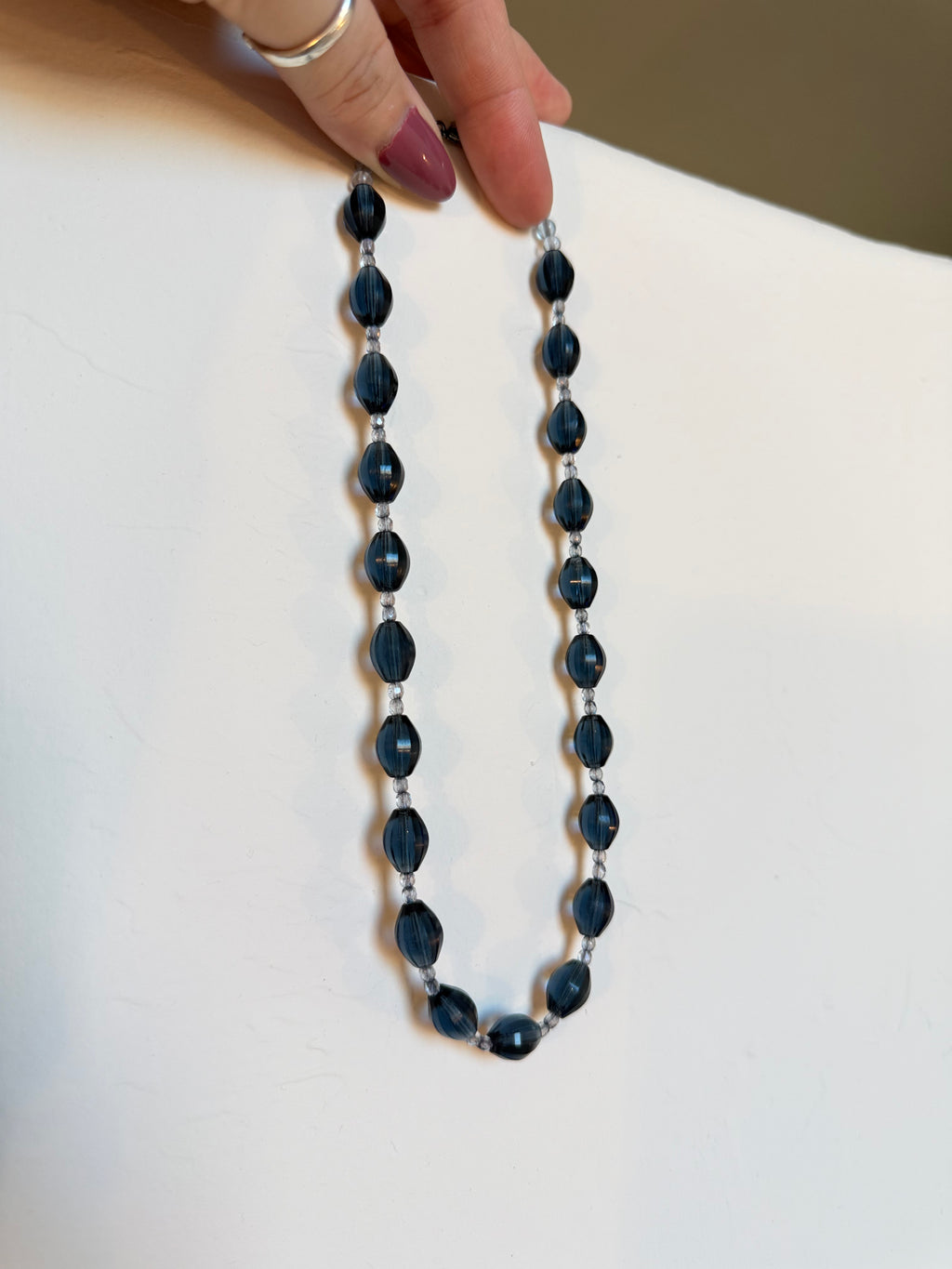 Deep blue faceted oval glass necklace