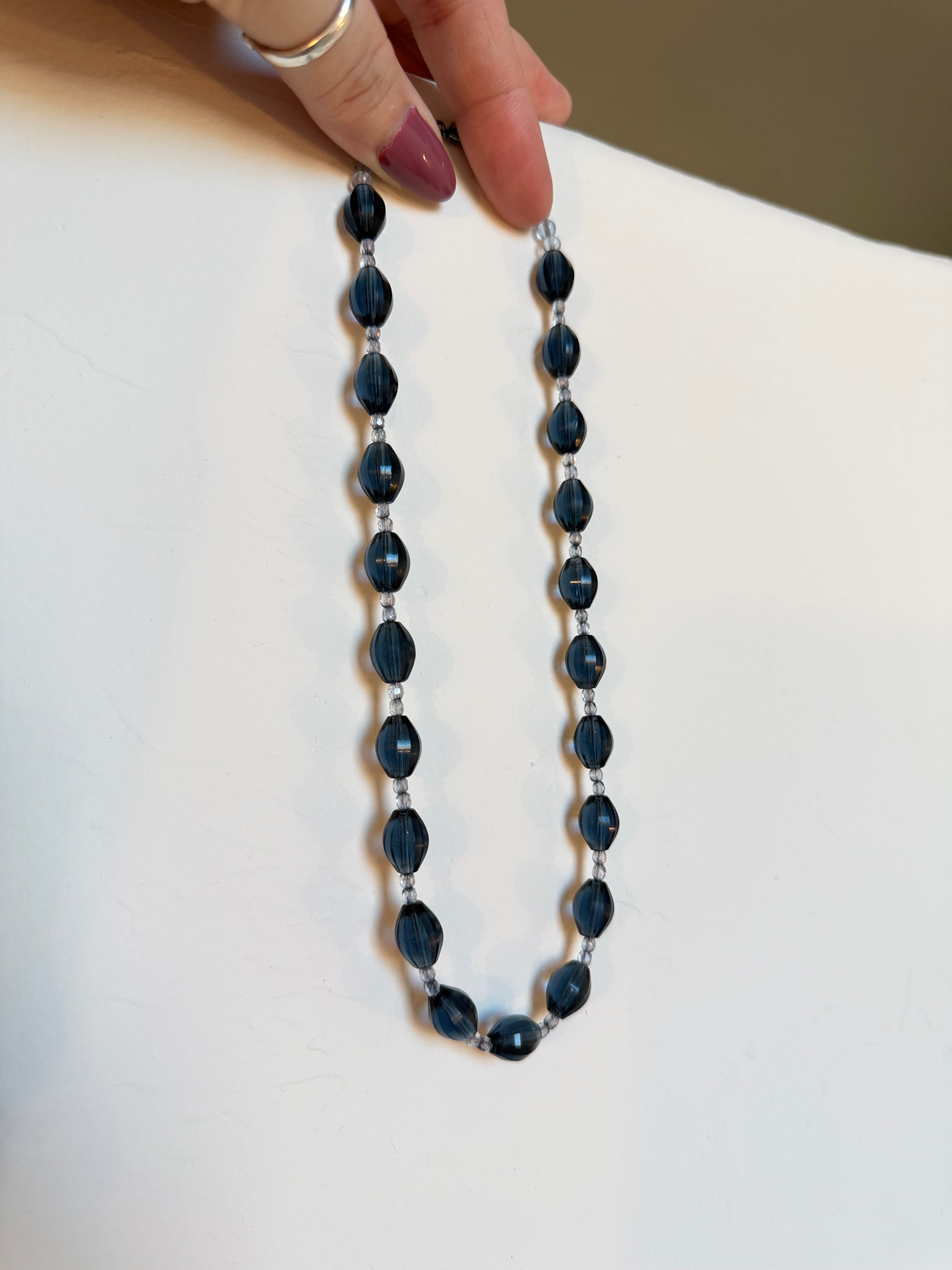 Deep blue faceted oval glass necklace