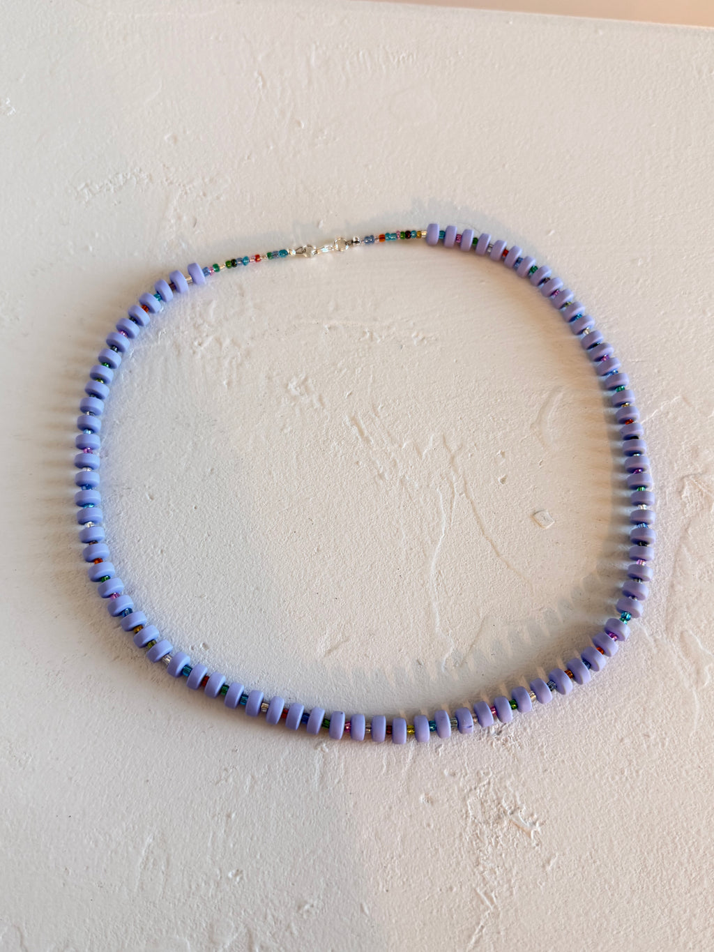 Lavender disc & rainbow seed bead necklace